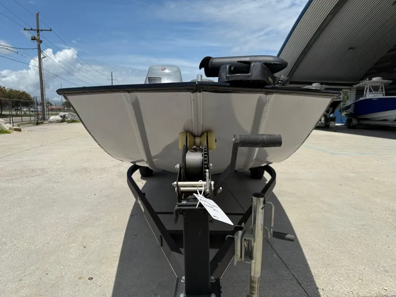 Slide: The Image of 2020 Bass Tracker Classic XL boat on trailer under clear sky. - 3