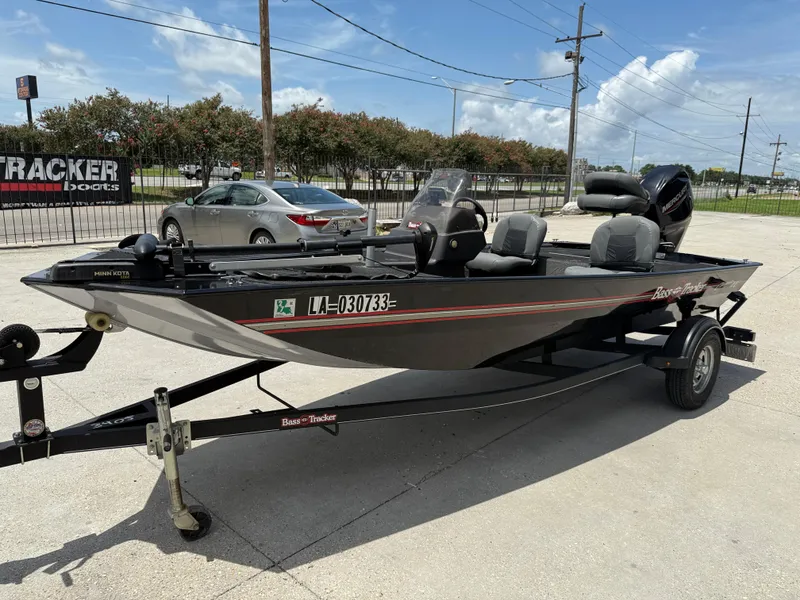 Slide: The Image of 2020 Bass Tracker Classic XL boat on trailer, parked outdoors. - 4