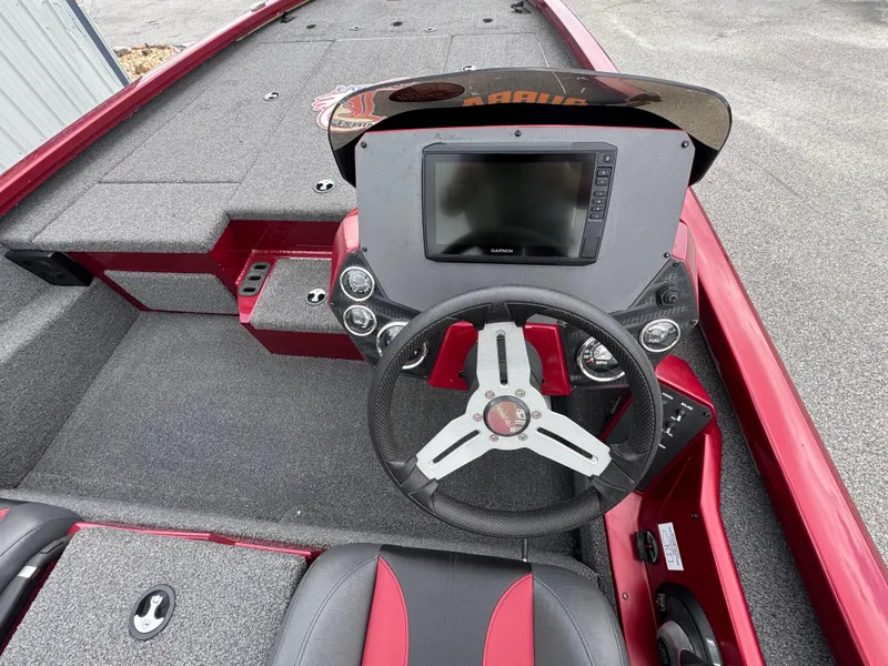 Slide: The Image of 2022 Vexus AVX2080 boat cockpit with steering wheel and Garmin display. - 14