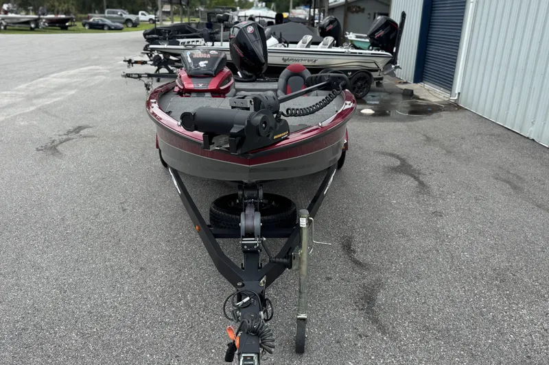 Slide: The Image of 2022 Vexus AVX2080 boat on trailer, parked outdoors near storage facility. - 3