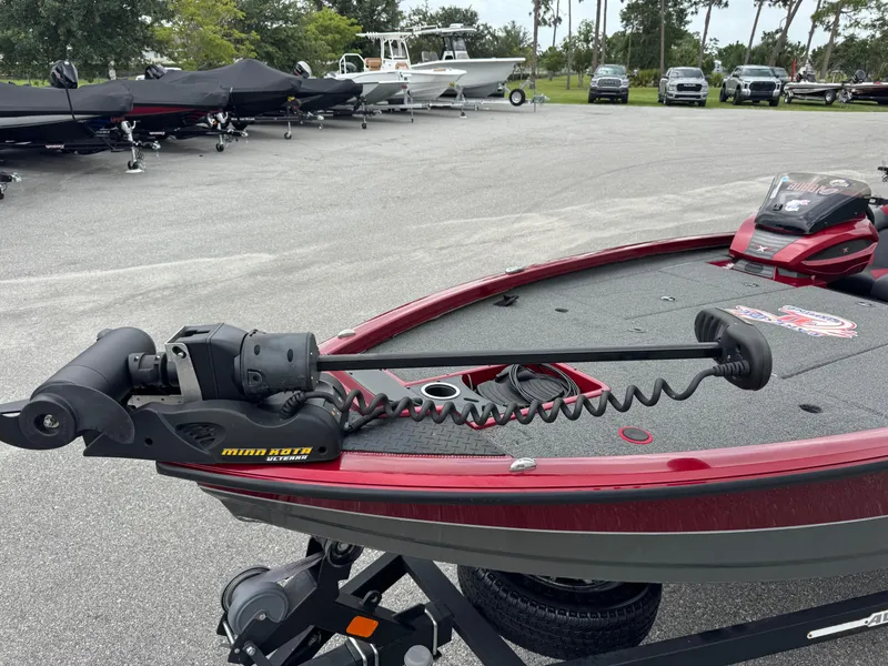 Slide: The Image of 2022 Vexus AVX2080 boat with Minn Kota trolling motor in parking lot. - 6