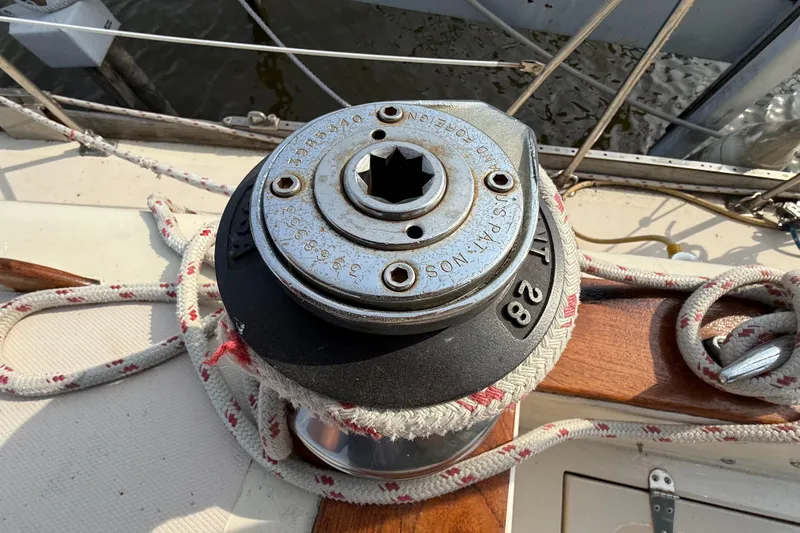 Slide: The Image of Winch on 1979 Gulfstar 43 MK II sailboat with coiled rope on deck. - 17