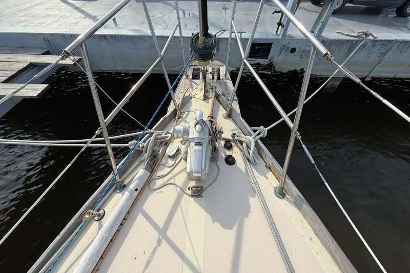 Slide: The Image of Bow of 1979 Gulfstar 43 MK II sailboat docked at marina. - 7