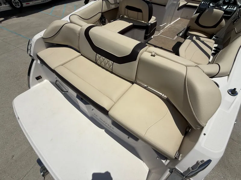 Slide: The Image of 2018 Regal 22 FasDeck boat interior with beige seating and modern design. - 18
