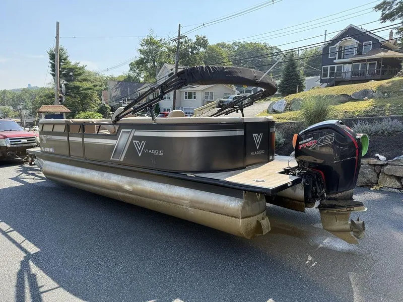 Slide: The Image of 2022 Viaggio L22U pontoon boat with Mercury Pro XS engine on a trailer. - 4
