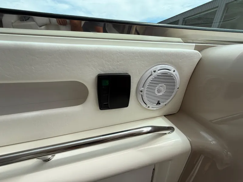 Slide: The Image of Interior of 2000 Sea Ray 460 Sundancer with speaker and control panel. - 12