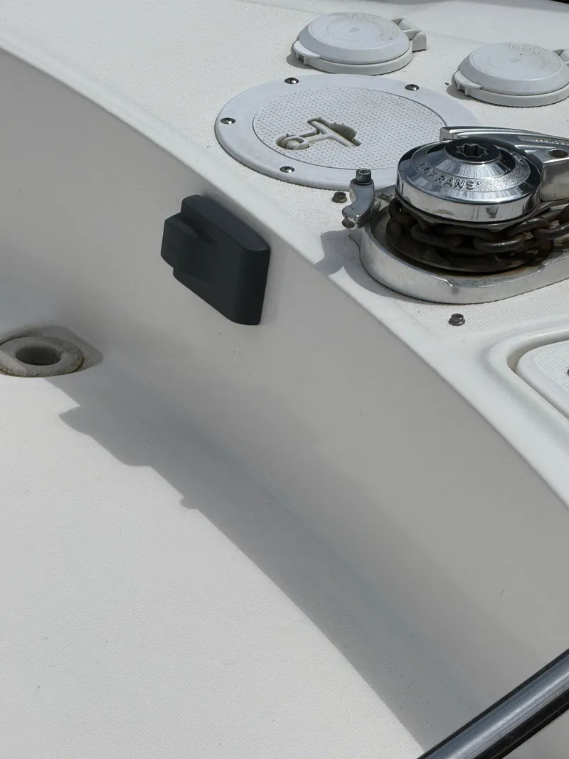 Slide: The Image of Close-up of 2000 Sea Ray 460 Sundancer boat deck with anchor winch. - 20