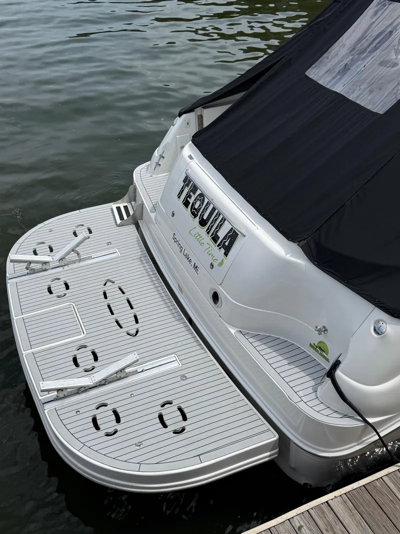 Slide: The Image of 2000 Sea Ray 460 Sundancer yacht with swim platform, docked in Spring Lake, MI. - 44