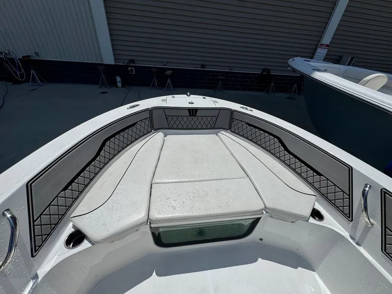 Slide: The Image of 2020 Wellcraft 182 Fisherman boat interior with cushioned seating and sleek design. - 7