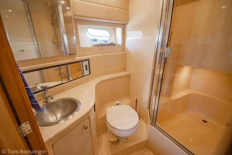 Slide: The Image of Luxurious bathroom in 2002 Bayliner 3988 Command Bridge Motoryacht with shower and sink. - 25