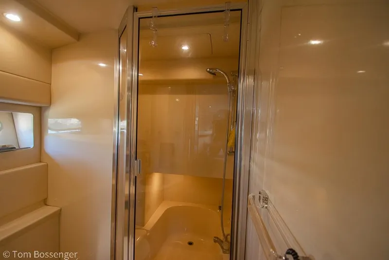Slide: The Image of Luxurious bathroom interior of 2002 Bayliner 3988 Command Bridge Motoryacht with shower. - 26