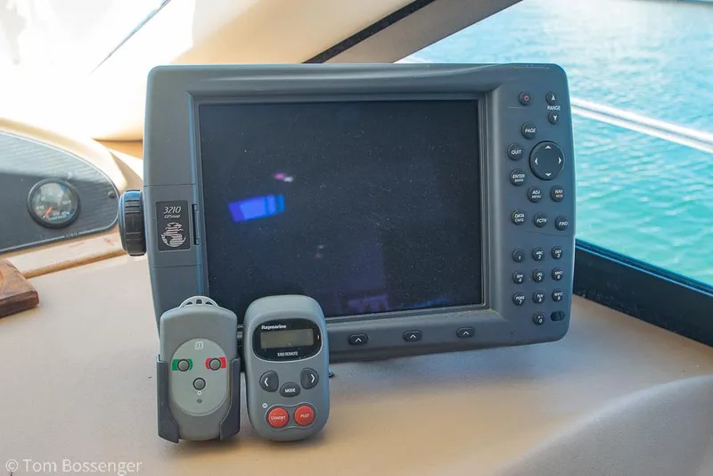 Slide: The Image of Control panel of 2002 Bayliner 3988 Command Bridge Motoryacht with navigation equipment. - 32