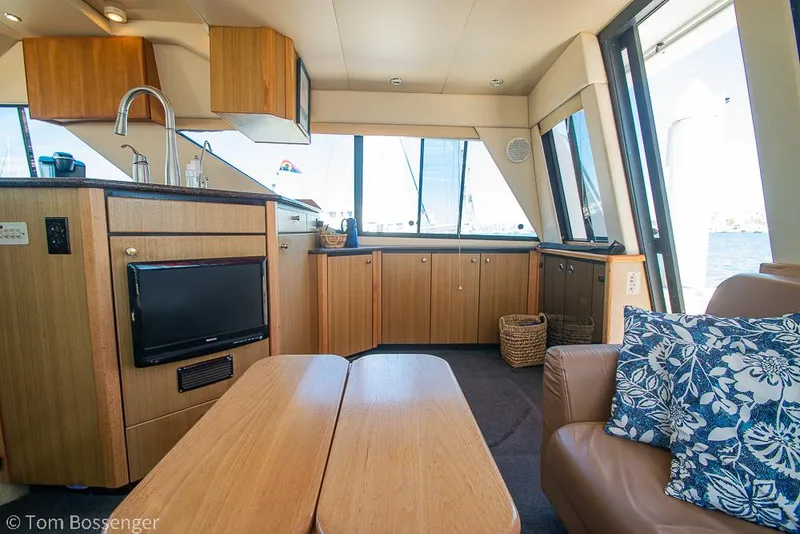 Slide: The Image of Interior of 2002 Bayliner 3988 Command Bridge Motoryacht with cozy seating and modern amenities. - 35