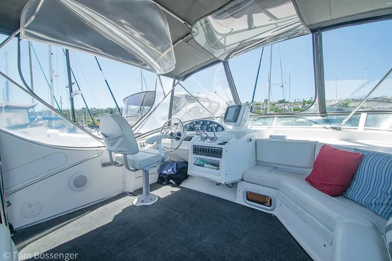 Slide: The Image of 2002 Bayliner 3988 Command Bridge Motoryacht interior with helm, seating, and navigation equipment. - 40