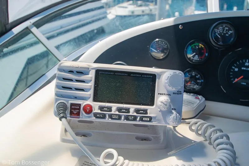 Slide: The Image of Close-up of a 2002 Bayliner 3988 yacht's radio and dashboard instruments. - 46