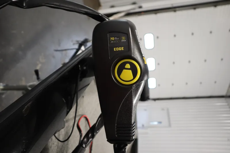 Slide: The Image of Trolling motor control on a 2012 Tracker 190 TX Pro Team boat. - 13