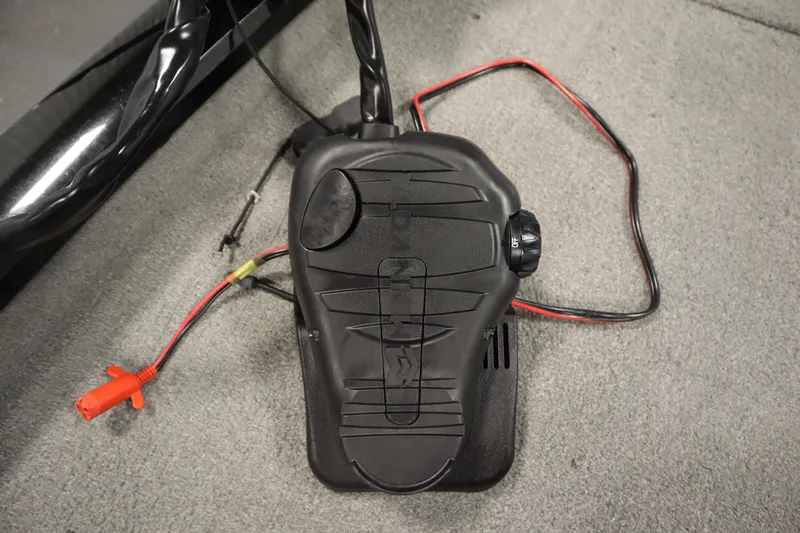 Slide: The Image of Foot pedal control with wiring on a 2012 Tracker 190 TX Pro Team boat. - 15