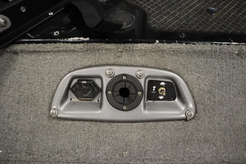 Slide: The Image of Control panel on 2012 Tracker 190 TX Pro Team boat, featuring tilt switch and socket. - 16