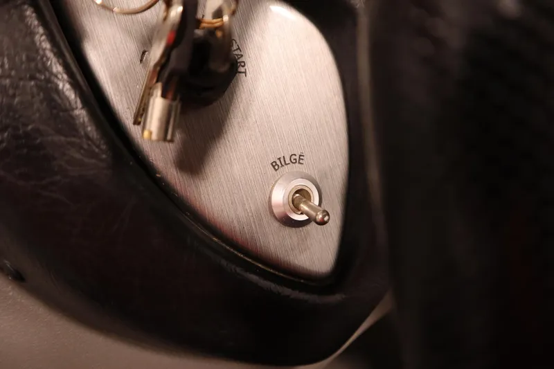 Slide: The Image of Close-up of a bilge switch on a 2012 Tracker 190 TX Pro Team boat. - 30