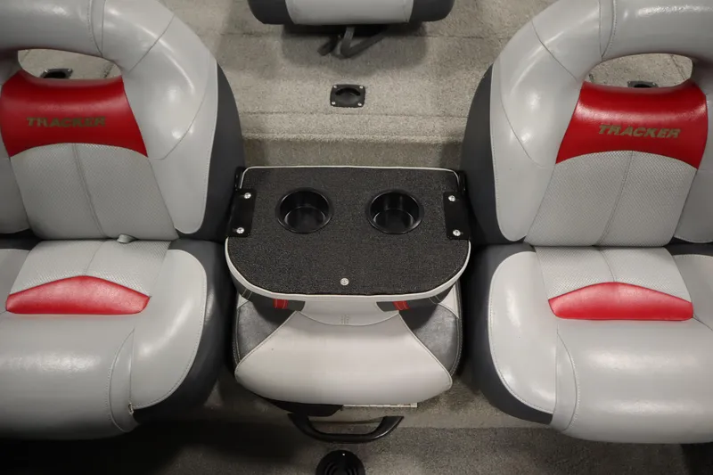 Slide: The Image of 2012 Tracker 190 TX Pro Team boat seats with center console and cup holders. - 34
