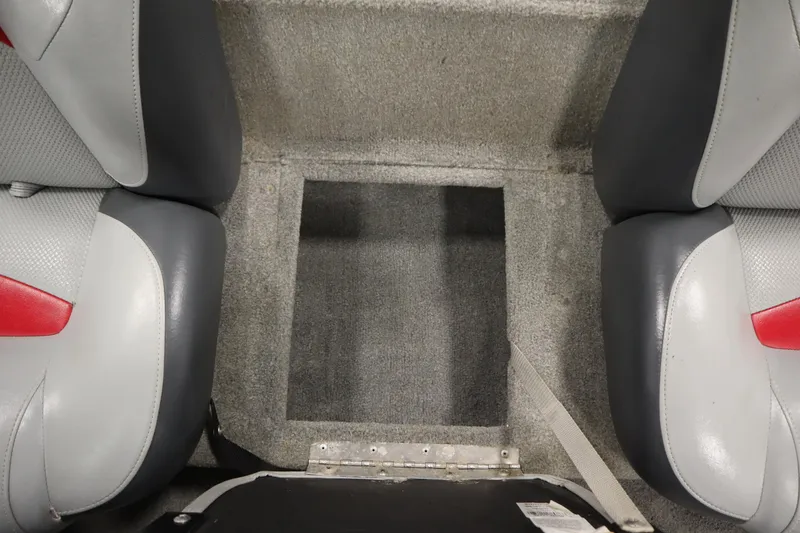 Slide: The Image of 2012 Tracker 190 TX Pro Team boat interior with gray and red seating. - 35