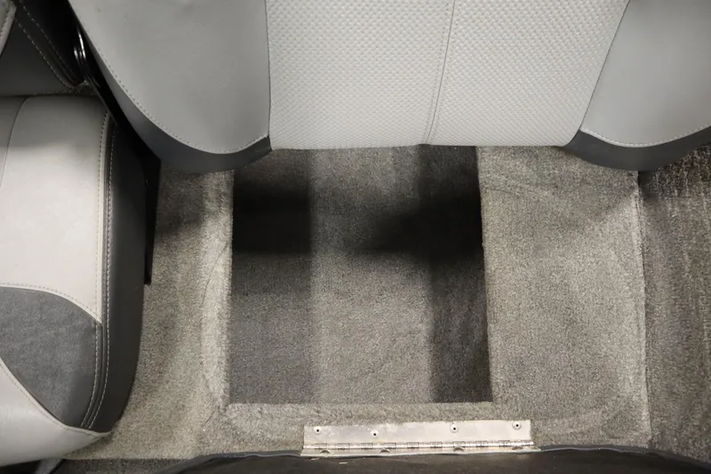 Slide: The Image of 2012 Tracker 190 TX Pro Team interior with gray carpet and seating. - 37