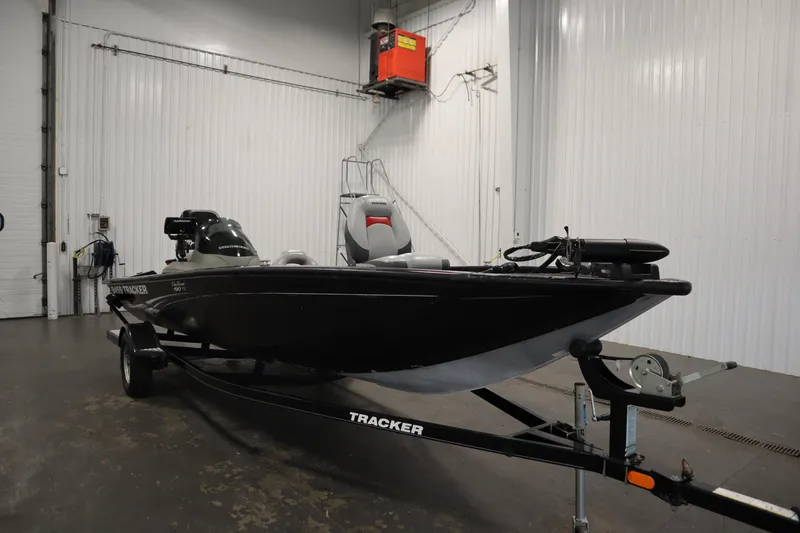 Slide: The Image of 2012 Tracker 190 TX Pro Team boat in indoor storage. - 4