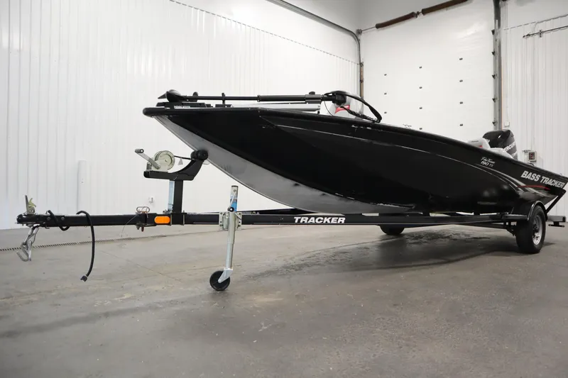 Slide: The Image of 2012 Tracker 190 TX Pro Team boat on trailer in indoor storage. - 48