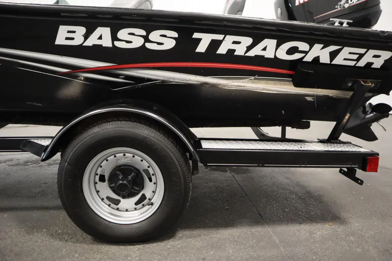 Slide: The Image of 2012 Tracker 190 TX Pro Team boat trailer with "Bass Tracker" branding. - 49