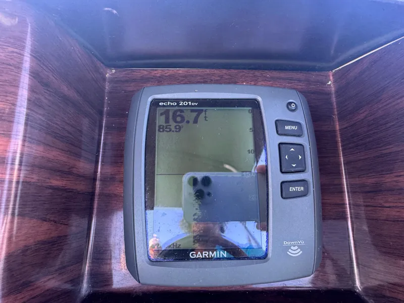 Slide: The Image of Garmin Echo 201dv fishfinder on 2016 Avalon Catalina 2385 Rear Fish boat dashboard. - 22