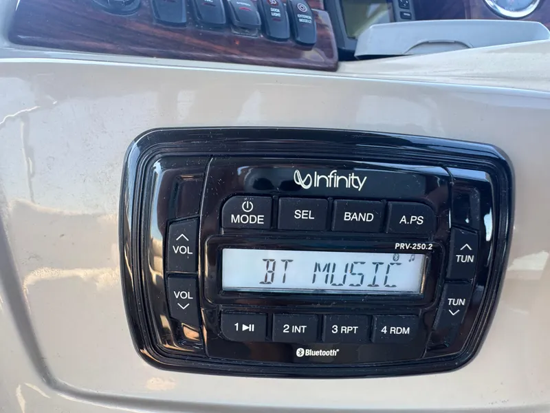 Slide: The Image of Infinity stereo system on 2016 Avalon Catalina 2385 Rear Fish boat dashboard. - 24