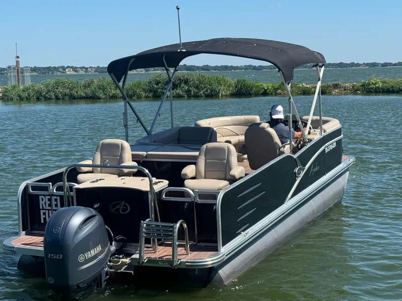 Slide: The Image of 2016 Avalon Catalina 2385 Rear Fish pontoon boat on a lake with Yamaha motor. - 6