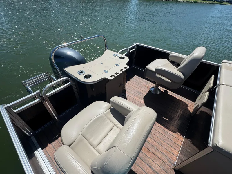 Slide: The Image of 2016 Avalon Catalina 2385 Rear Fish boat with comfortable seating on a sunny day. - 9