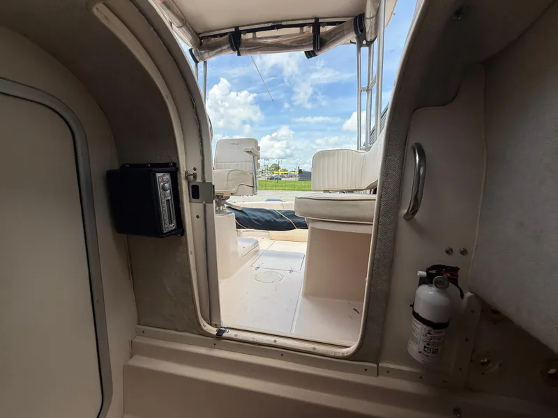 Slide: The Image of Interior view of 1997 Grady-White F-26 Tigercat boat, showing seating and equipment. - 19