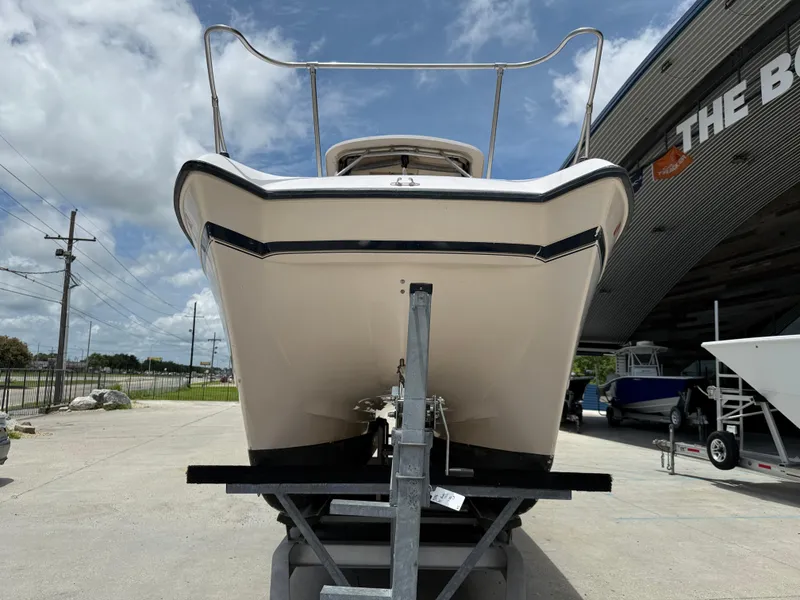 Slide: The Image of 1997 Grady-White F-26 Tigercat boat on trailer, viewed from the front. - 3