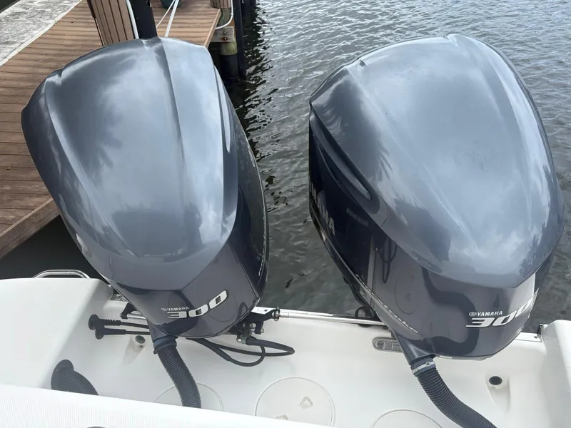Slide: The Image of Twin Yamaha 300 engines on a 2018 Robalo R302 Center Console boat. - 25