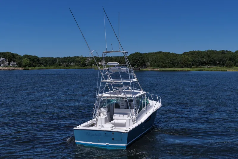 Slide: The Image of 2018 Albemarle 36 Express boat on calm water with clear blue sky. - 10