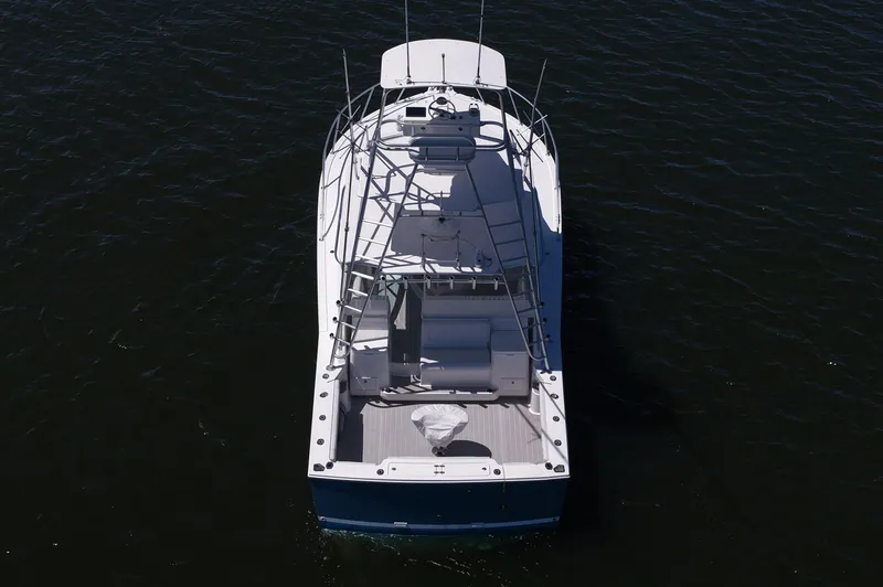 Slide: The Image of 2018 Albemarle 36 Express boat on dark water, aerial view. - 19