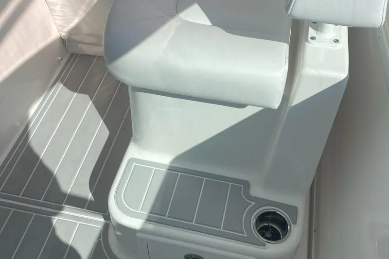 Slide: The Image of 2018 Albemarle 36 Express boat seat with integrated cup holder. - 23