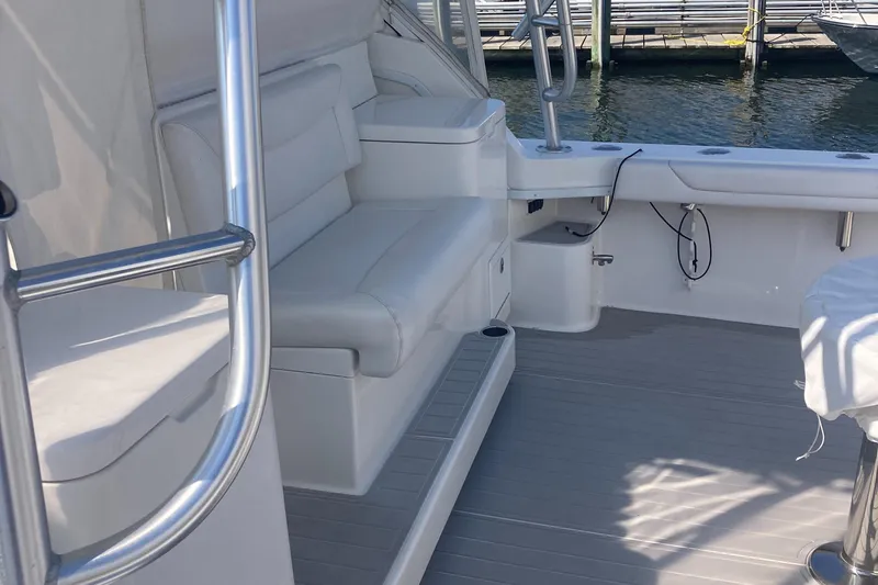 Slide: The Image of 2018 Albemarle 36 Express boat interior with white seating and sleek design. - 24