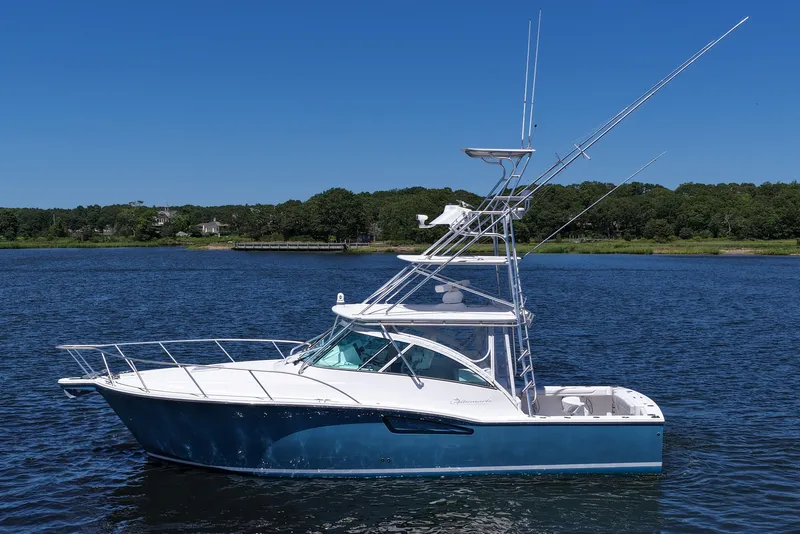 Slide: The Image of 2018 Albemarle 36 Express boat on calm water with clear blue sky. - 5