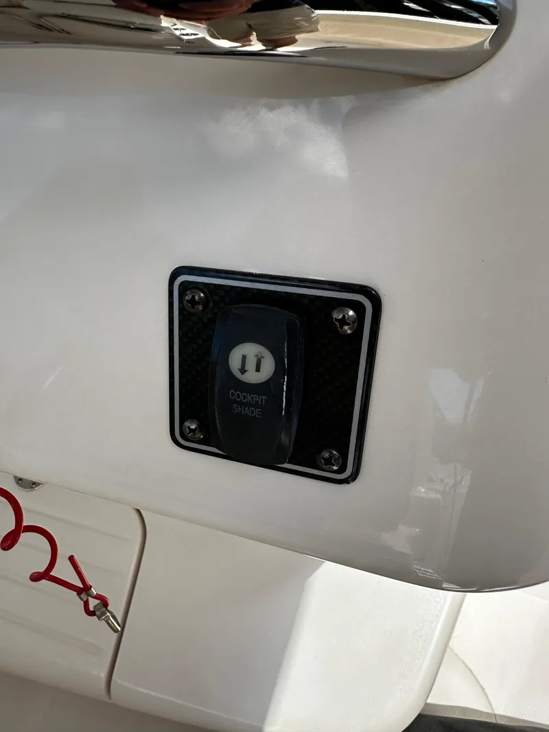 Slide: The Image of Cockpit shade switch on 2017 Grady-White Canyon 376 boat. - 20