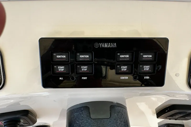 Slide: The Image of Control panel of a 2017 Grady-White Canyon 376 boat with Yamaha ignition switches. - 31