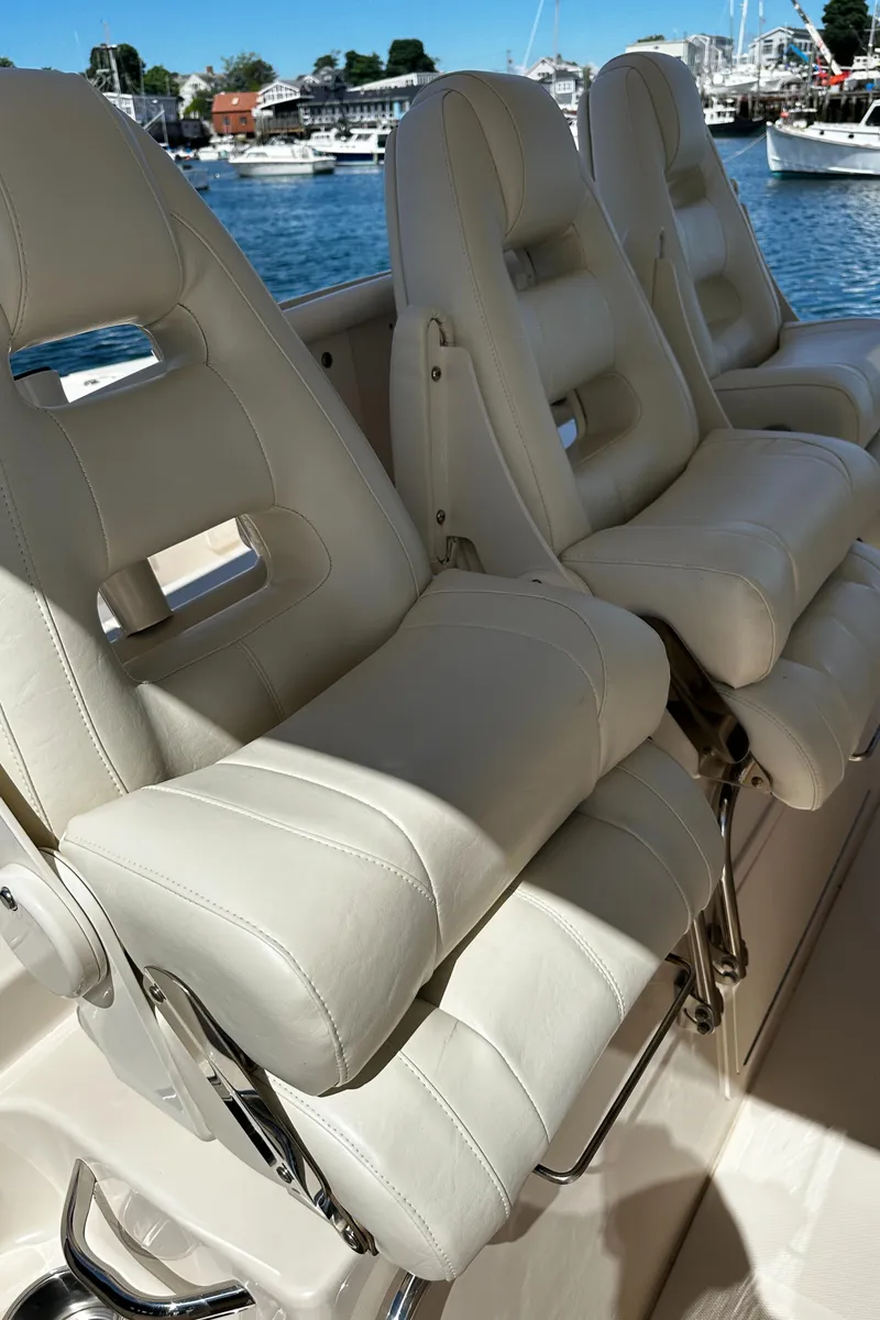 Slide: The Image of Luxurious seating on 2017 Grady-White Canyon 376 boat, with scenic harbor view. - 35