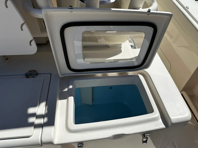 Slide: The Image of Open storage compartment on 2017 Grady-White Canyon 376 boat. - 47