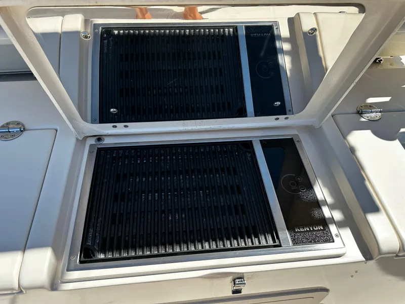 Slide: The Image of 2017 Grady-White Canyon 376 boat grill with Kenyon electric cooktop. - 48