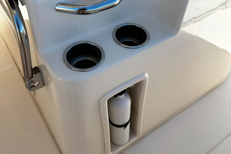 Slide: The Image of 2017 Grady-White Canyon 376 boat console with cup holders and storage compartment. - 49