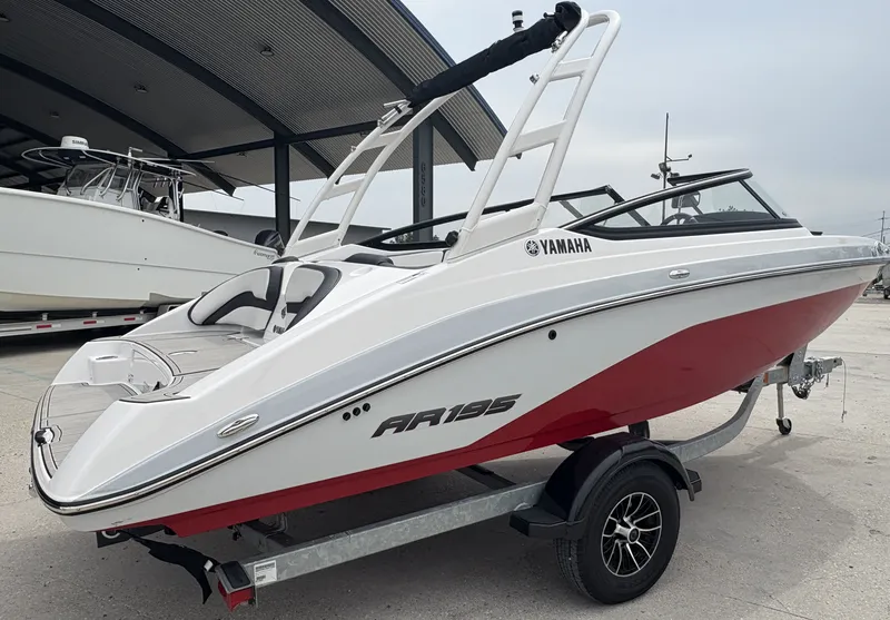 Slide: The Image of 2024 Yamaha Boats AR 195 interior with sleek seating and modern design. - 6