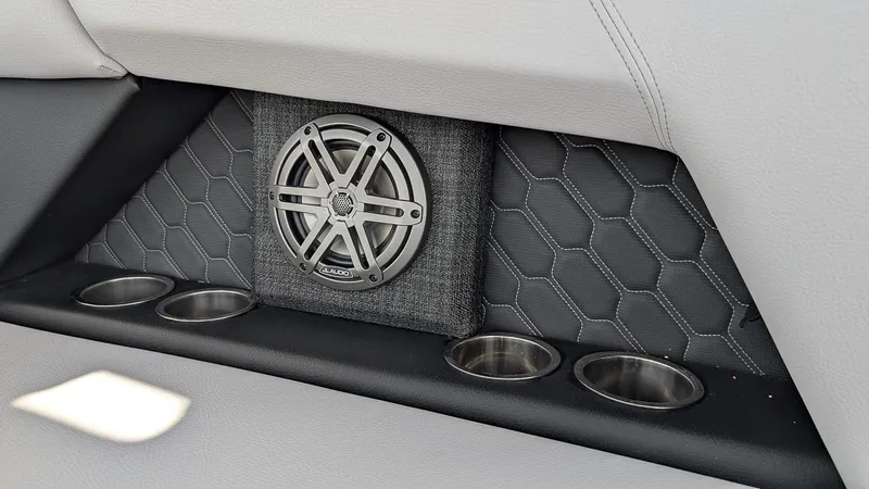 Slide: The Image of 2026 Four Winns H6 OB interior with speaker and cup holders. - 11