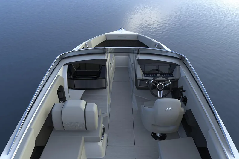 Slide: The Image of Manufacturer Provided Image: 2025 Four Winns H6 OB boat interior with sleek design and modern steering console on calm water. - 32